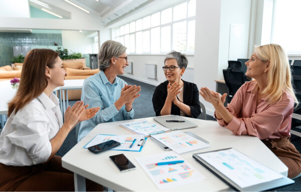 team celebrating successful meeting