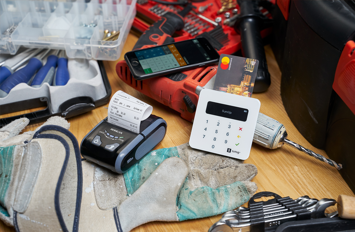 card reader beside work tools